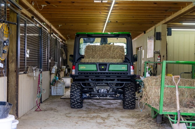 John Deere Equine Discount Program at Koenig Equipment Gator in Barn