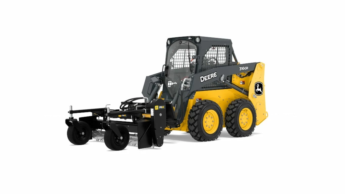 Front left studio view of 316GR Skid Steer with PR60 Power Rake