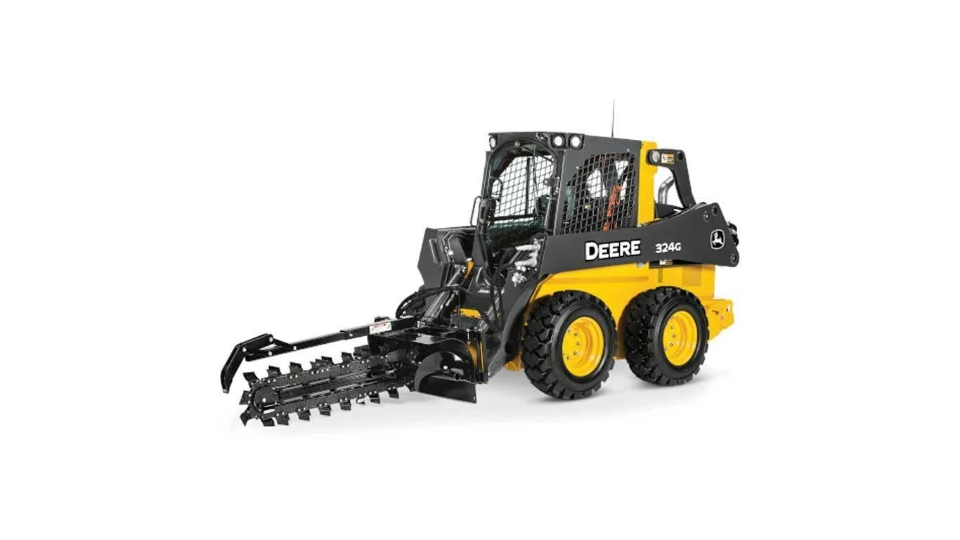 Front left studio view of 324G Skid Steer with trencher attachment
