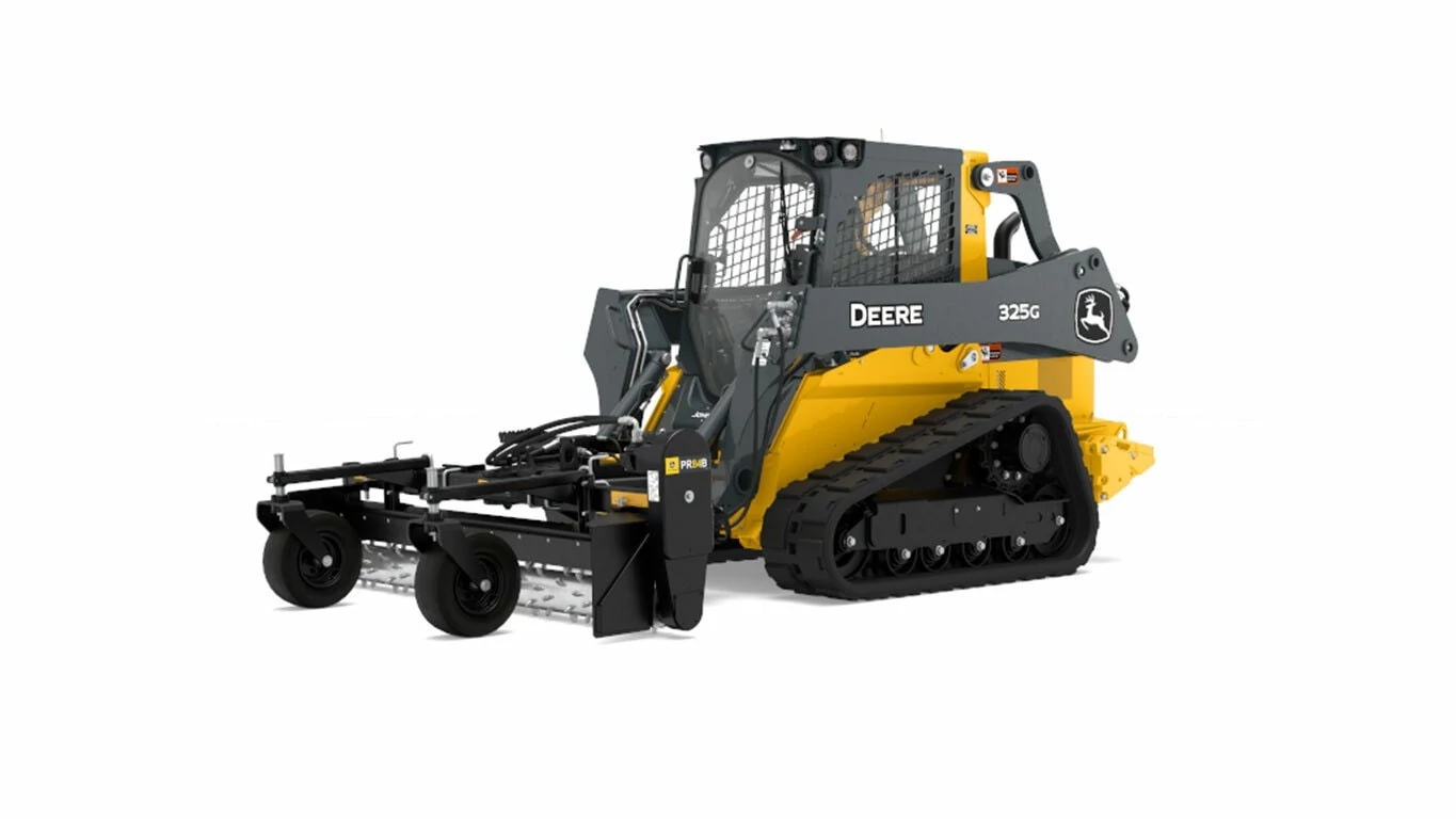 Front left studio view of 325G Compact Track Loader with PR84B Power Rake