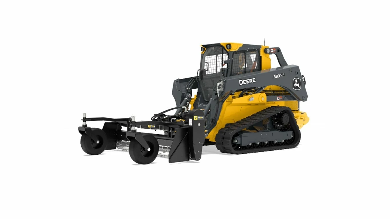 Front left studio view of 333 P-Tier Compact Track Loader with PR96B Power Rake