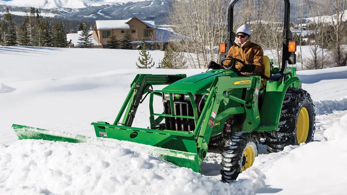 AF11G Front Blade clearing snow
