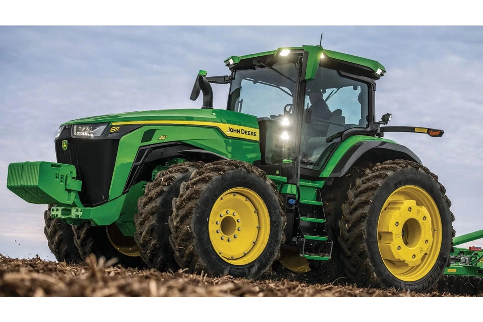 8R 410 Tractor in a corn field