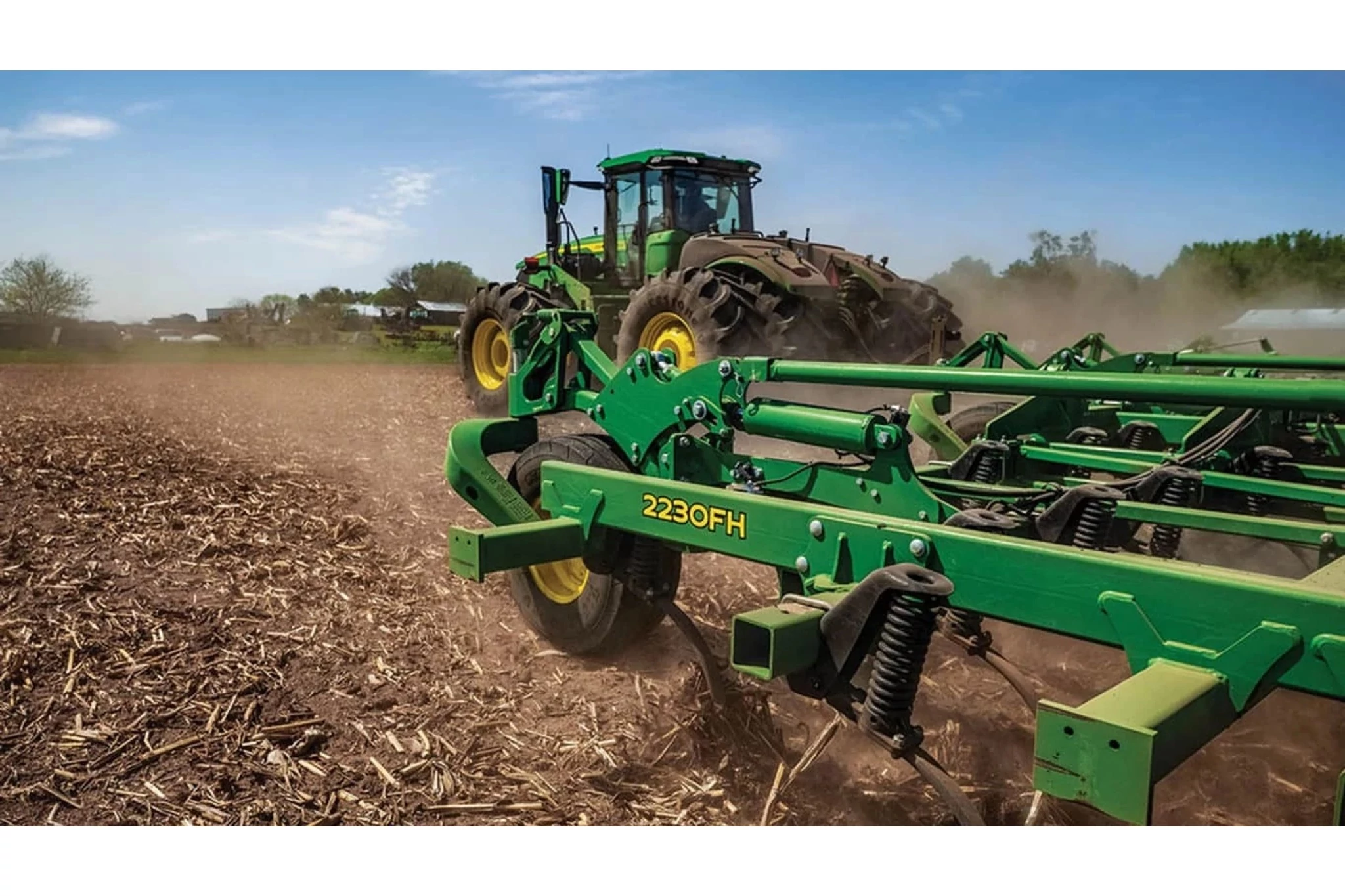 9R 440 Tractor with a tillage attachment in a harvested corn field