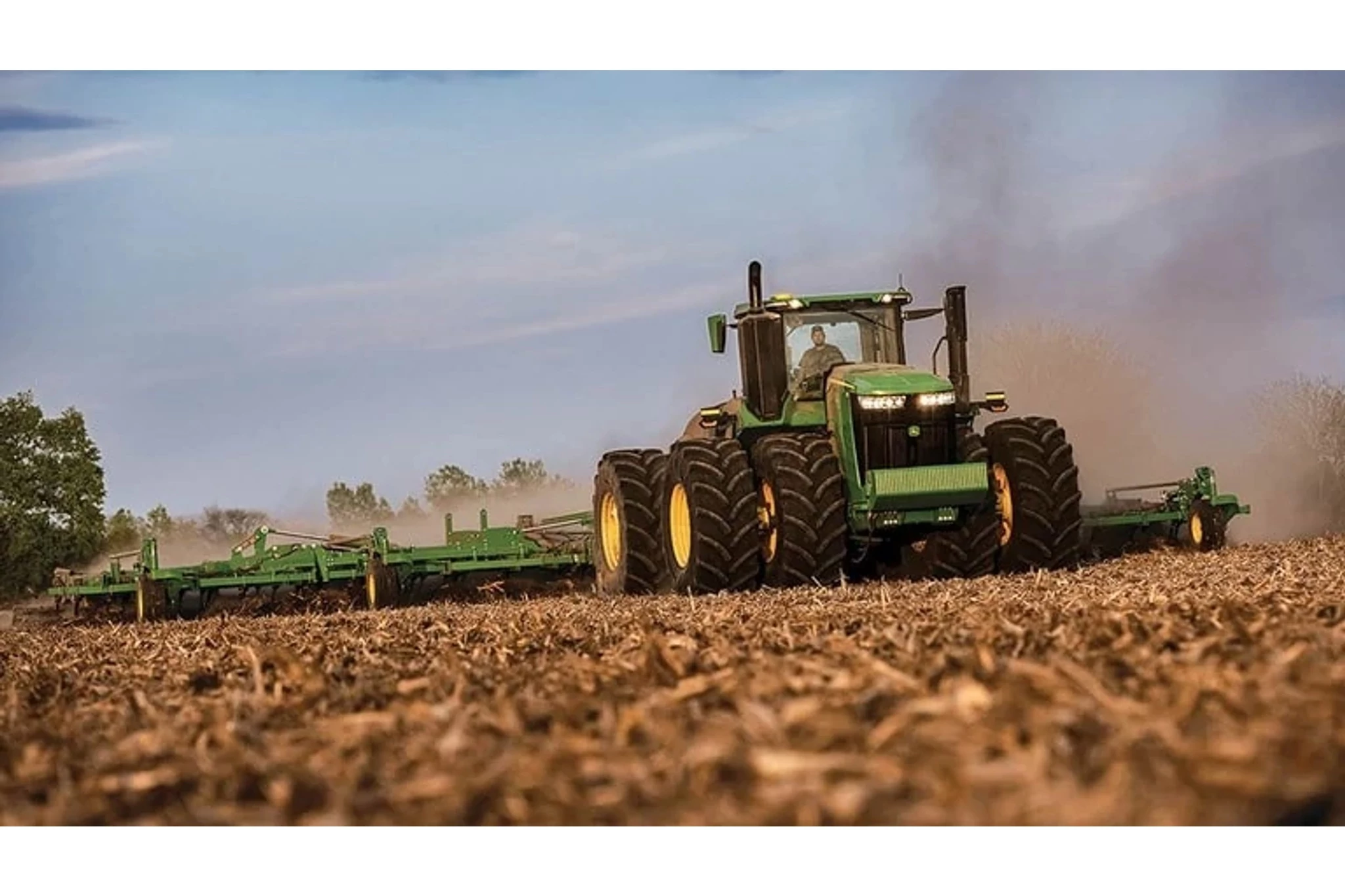 9R 490 Tractor tilling a corn field