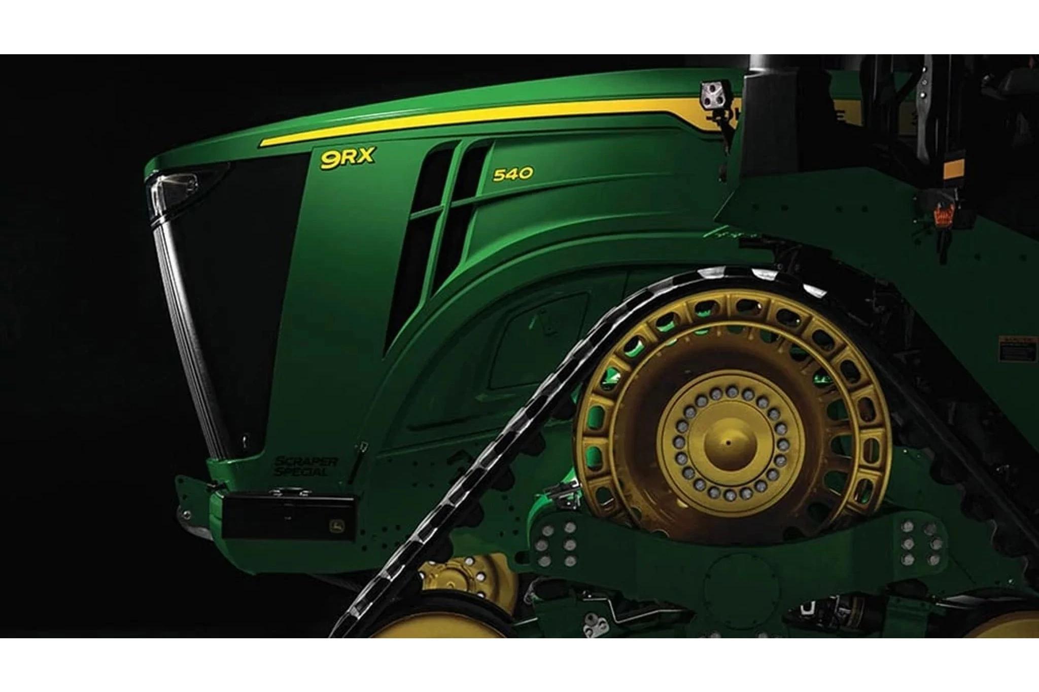 Studio image of the front of a 9RX 540 Scraper Special Tractor