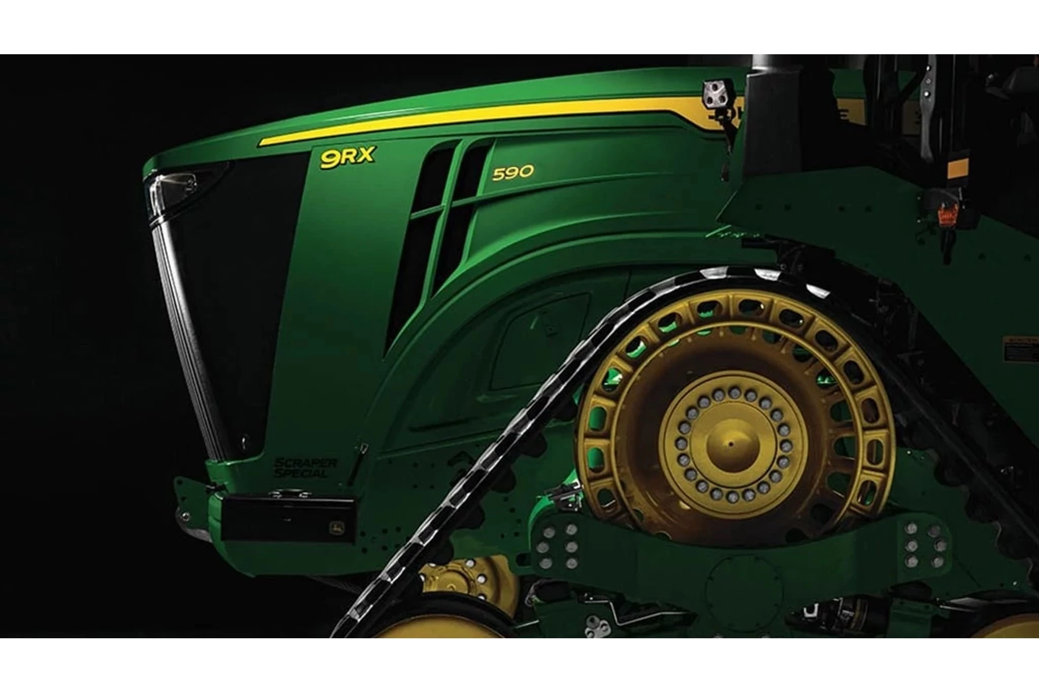 Studio image of the front of a 9RX 590 Scraper Special Tractor