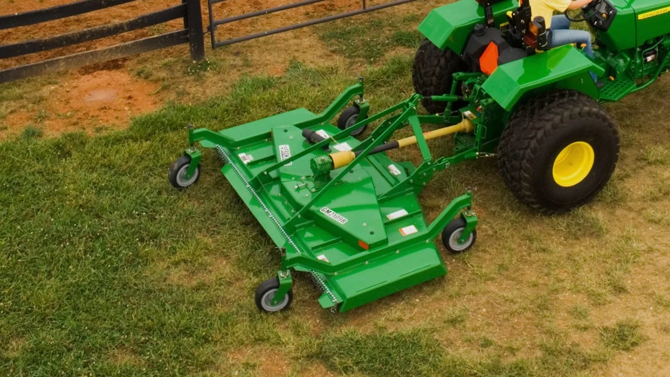 GM21 Series Frontier Grooming Mower pulled by tractor in field