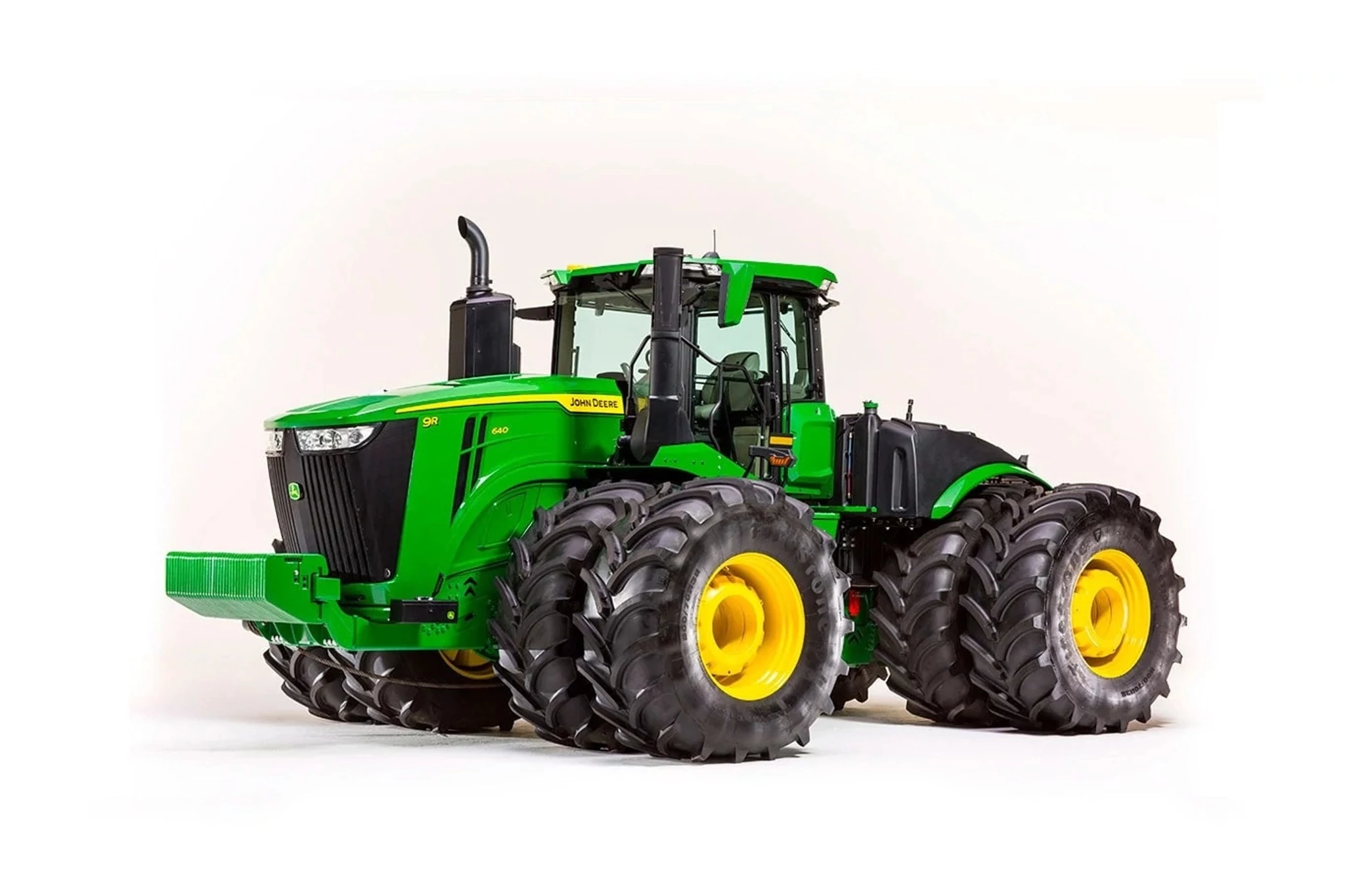 Studio image of 9R 640 tractor from the front left.